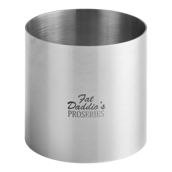 A stainless steel round cake ring mold with a Fat Daddio's logo.
