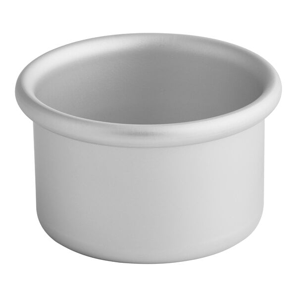 A Fat Daddio's round anodized aluminum mini cake pan with straight sides on a white background.