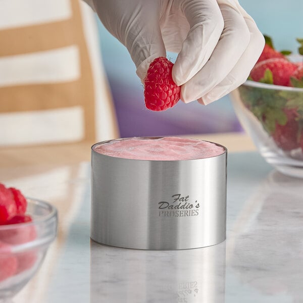 A stainless steel round cake or food ring mold from Fat Daddio's ProSeries, measuring 3 inches by 2 inches.