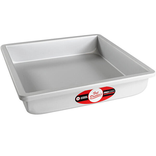 A white rectangular tray with a red and white label.