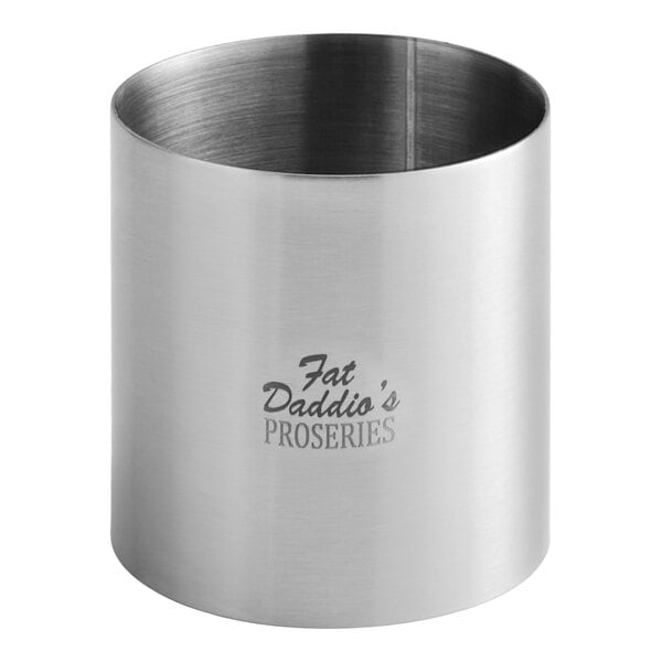 A stainless steel Fat Daddio's round cake ring mold.