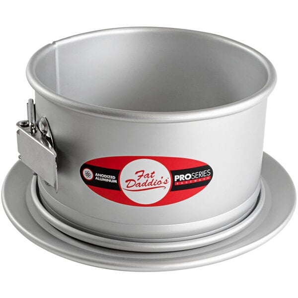 A round metal Fat Daddio's springform cake pan.