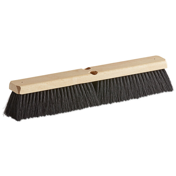 A Carlisle hardwood broom head with Tampico bristles on a white background.