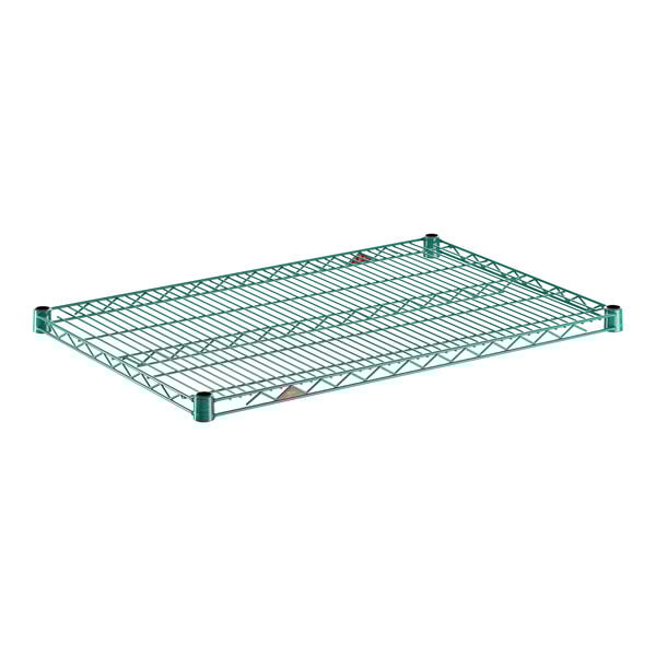 A green wire shelf measuring 24 inches by 36 inches.