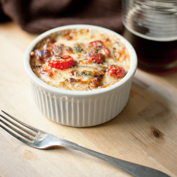 a bowl of food with a fork