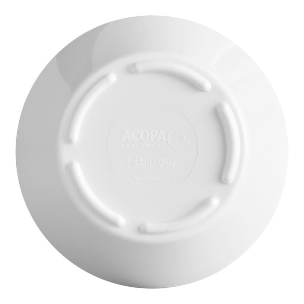 A white melamine bouillon cup shown from the bottom.