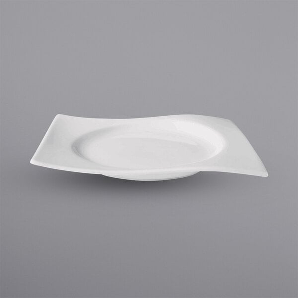 A white rectangular porcelain plate with a wave edge.