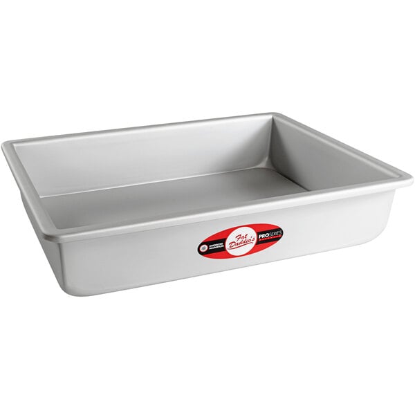 a rectangular silver pan with a red and white label