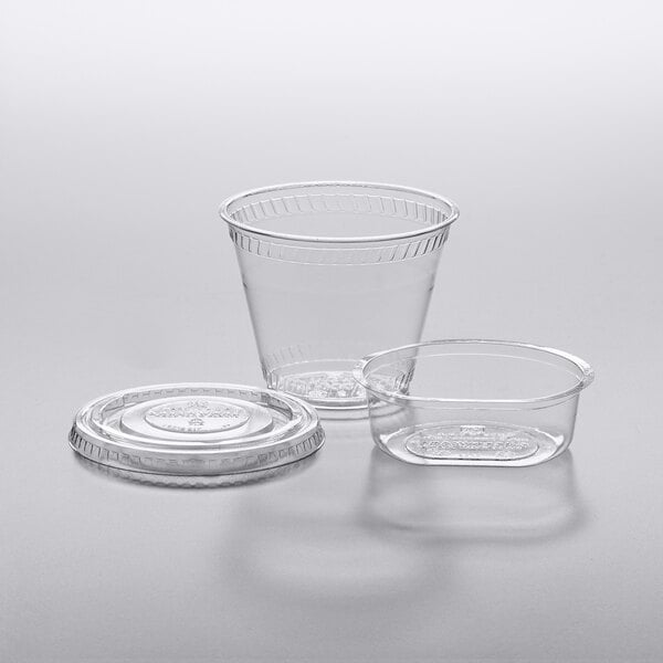 A clear plastic Fabri-Kal parfait cup with a clear plastic insert and lid.