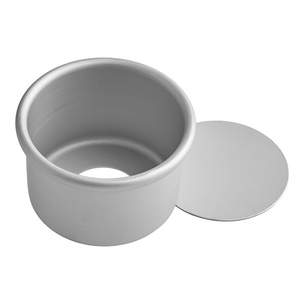 A silver metal Fat Daddio's round cheesecake pan with a removable bottom.