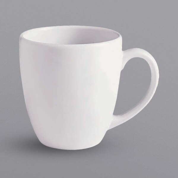 A close-up of a white Corona Selecta mug with a handle.