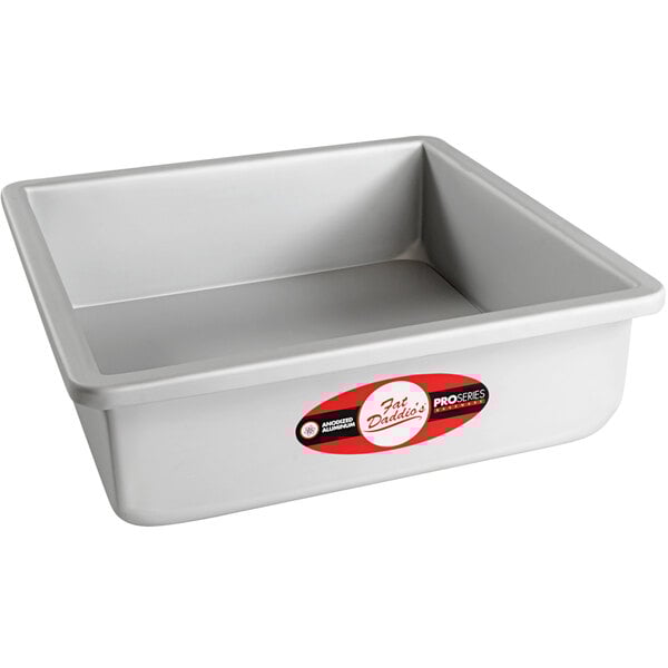 a silver rectangular pan with a red and white label
