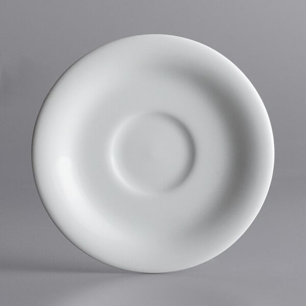 A white plate with a circle in the middle.