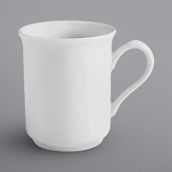 A white mug with a handle.