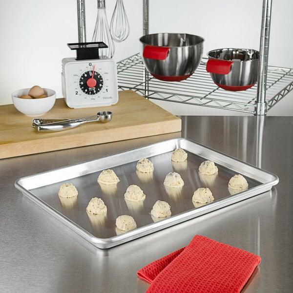 A Fat Daddio's baking tray with cookies on it.