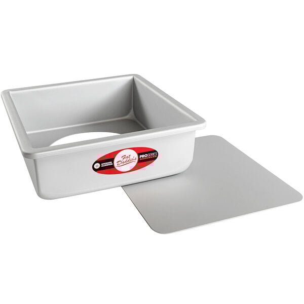 A white rectangular container with a red label for a Fat Daddio's square cheesecake pan.