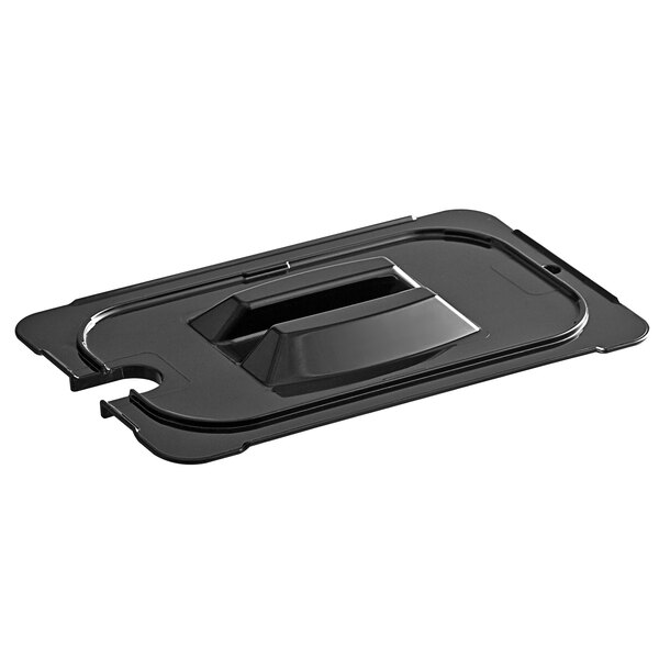 A black plastic food pan lid with a handle and notch.