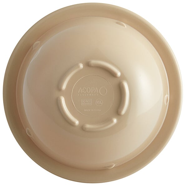 An Acopa Foundations tan melamine bowl with a narrow rim.
