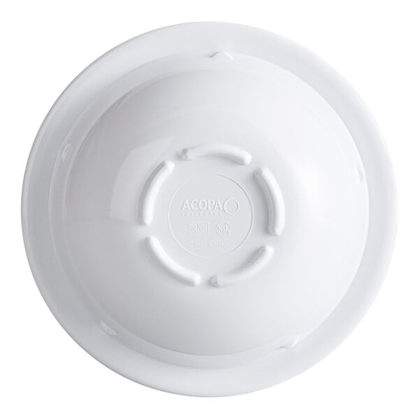 A white melamine grapefruit bowl with a narrow rim, shown upside down.