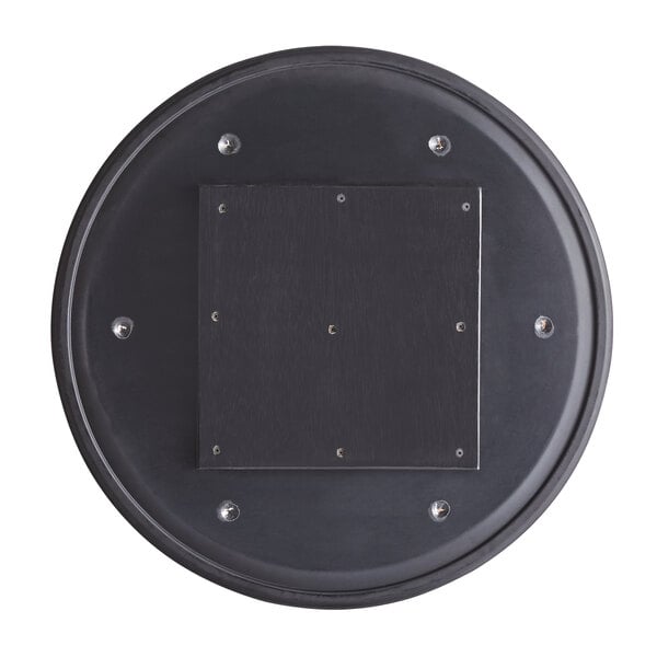 A black circular Lancaster Table & Seating Excalibur table top with screws and holes.