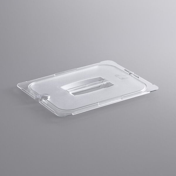 A clear plastic food pan lid with a handle and notch.