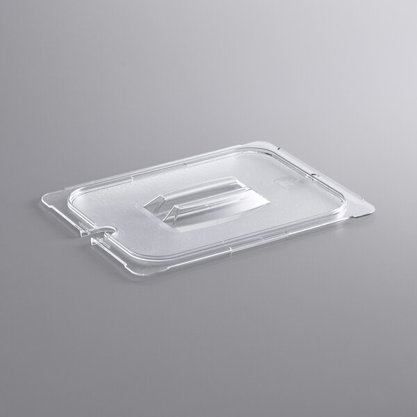 A clear plastic food pan lid with a handle and notch.