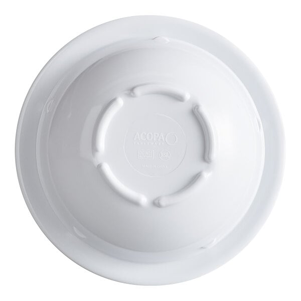 A white melamine grapefruit bowl shown upside down.