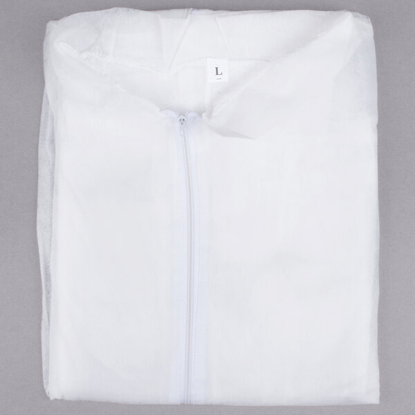 A white Cordova disposable coverall in a transparent bag.