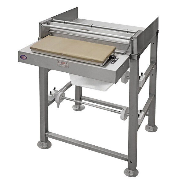 A Heat Seal SM-1 ScaleMate film wrapping machine on a white table.