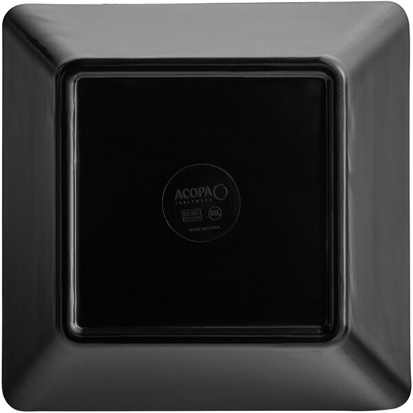A black square Acopa Rittenhouse melamine bowl with white text on a circular logo.