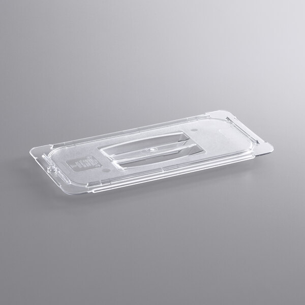 A clear plastic Vigor food pan lid with handles.
