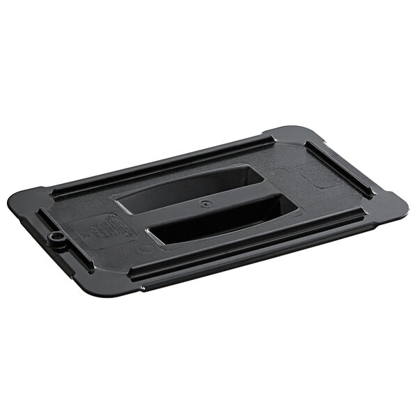 A black plastic food pan lid with a handle.