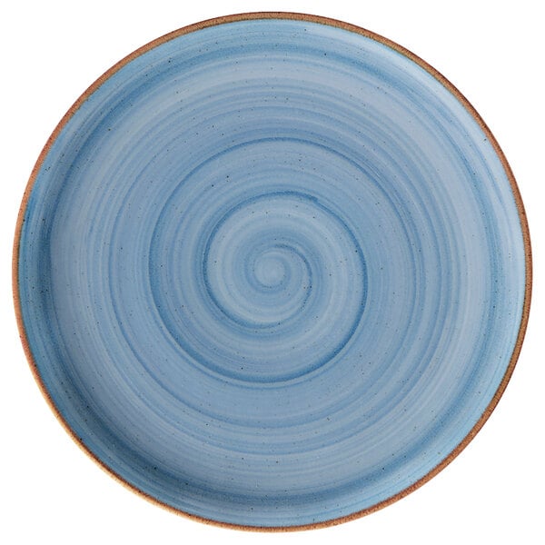 A blue porcelain coupe plate with a blue and brown spiral design.