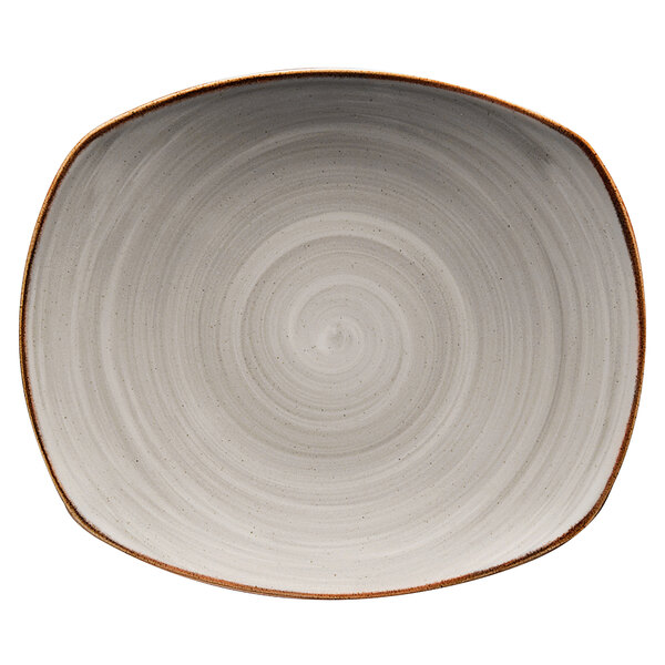 A grey porcelain oval plate with a spiral pattern.