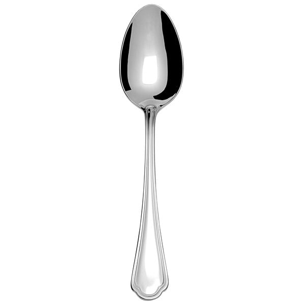 A Fortessa stainless steel dinner spoon with a black handle on a white background.