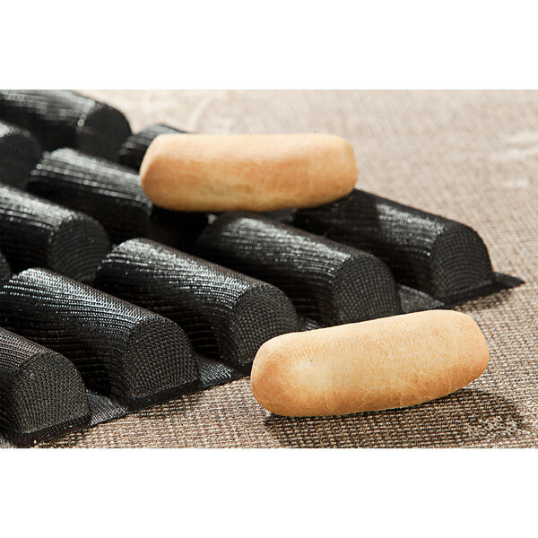 A piece of rectangular bread made in a Sasa Demarle black silicone loaf mold.