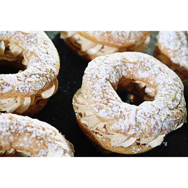 A close-up of a pastry with powdered sugar.