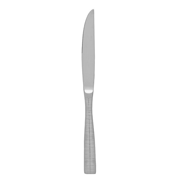 a silver knife on a white background