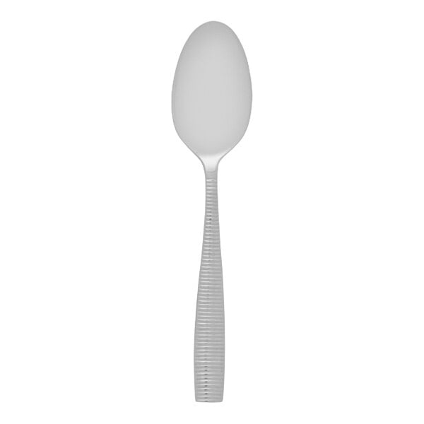 A stainless steel serving spoon with a textured handle.
