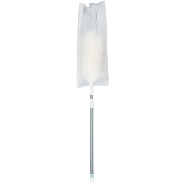 A white duster with a silver handle.