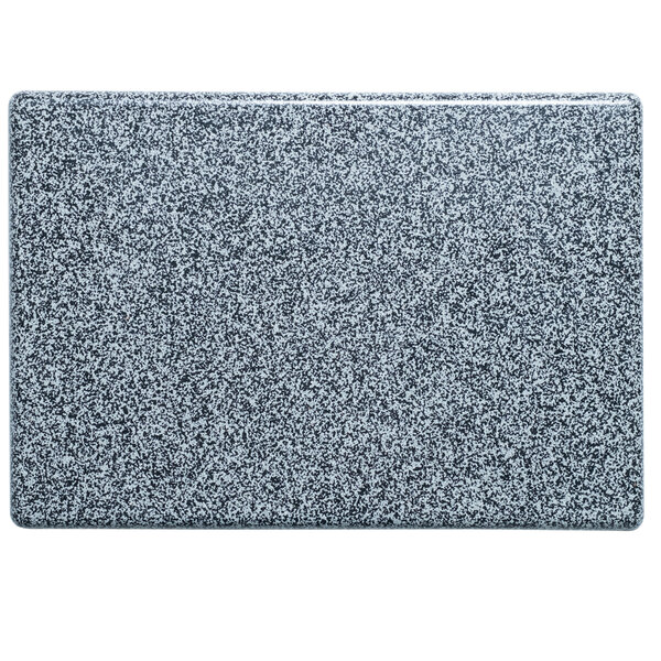 A close-up of a gray speckled rectangular panel.