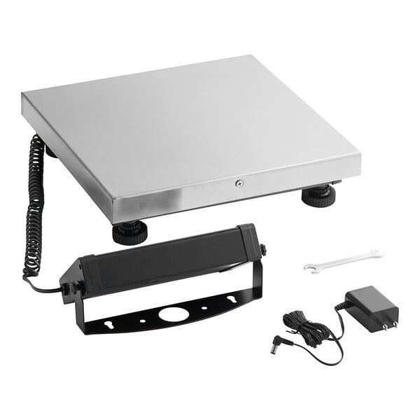 A silver Avaweigh digital receiving scale with a black remote display cord.