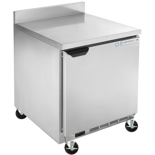 A silver Beverage-Air worktop freezer on wheels.