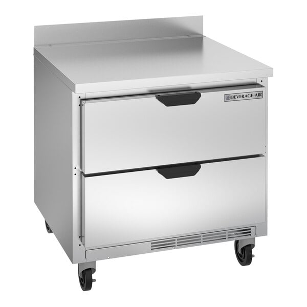 A silver stainless steel Beverage-Air worktop refrigerator with two drawers.