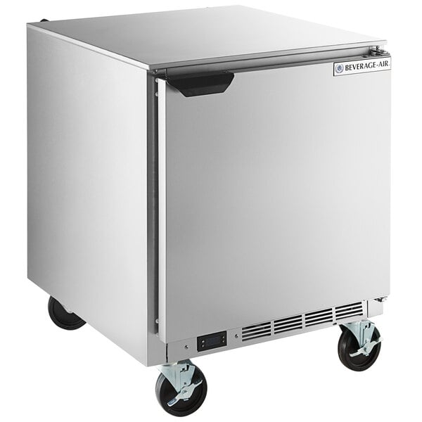 A silver Beverage-Air undercounter freezer with wheels.