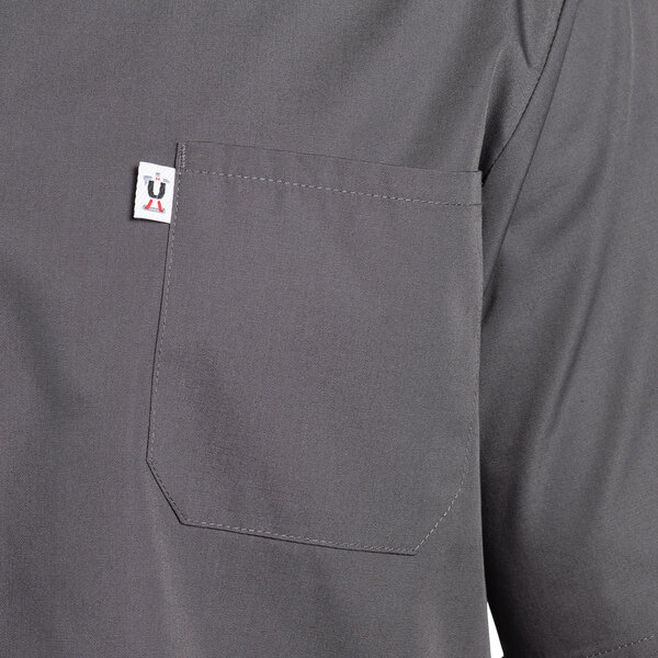 A slate gray Uncommon Chef cook shirt with a pocket.