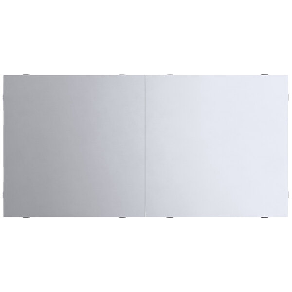 A white rectangular object with metal corners.