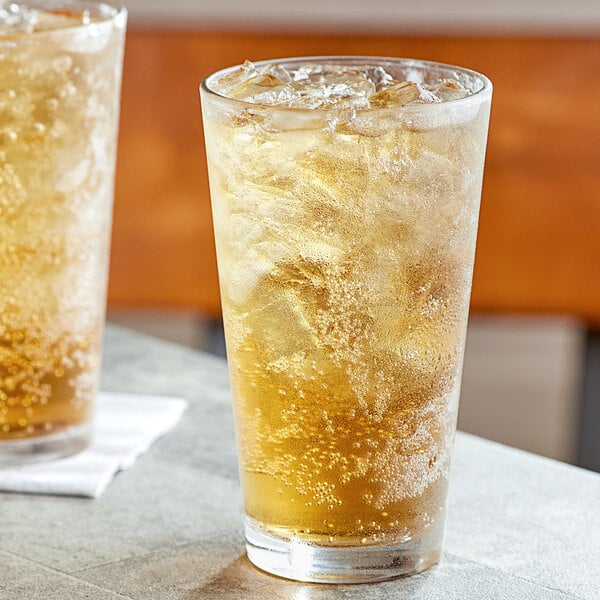 Two glasses of Boylan Creme Soda with ice sitting on a counter.