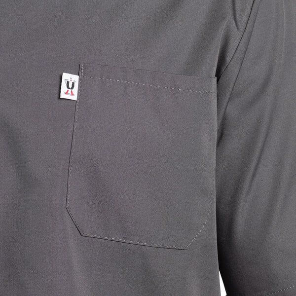 The back of a slate gray Uncommon Chef cook shirt with a pocket.