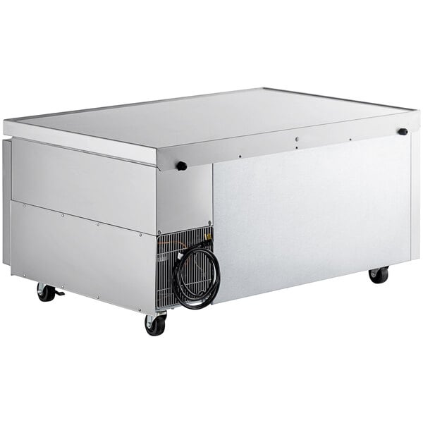 A large rectangular silver Beverage-Air chef base with wheels.